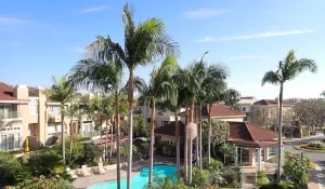 Well-maintained Southern California HOA community with palm trees, pool, and professional property management support.